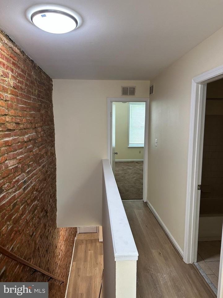 115 N Curley St - Photo 7 of 10