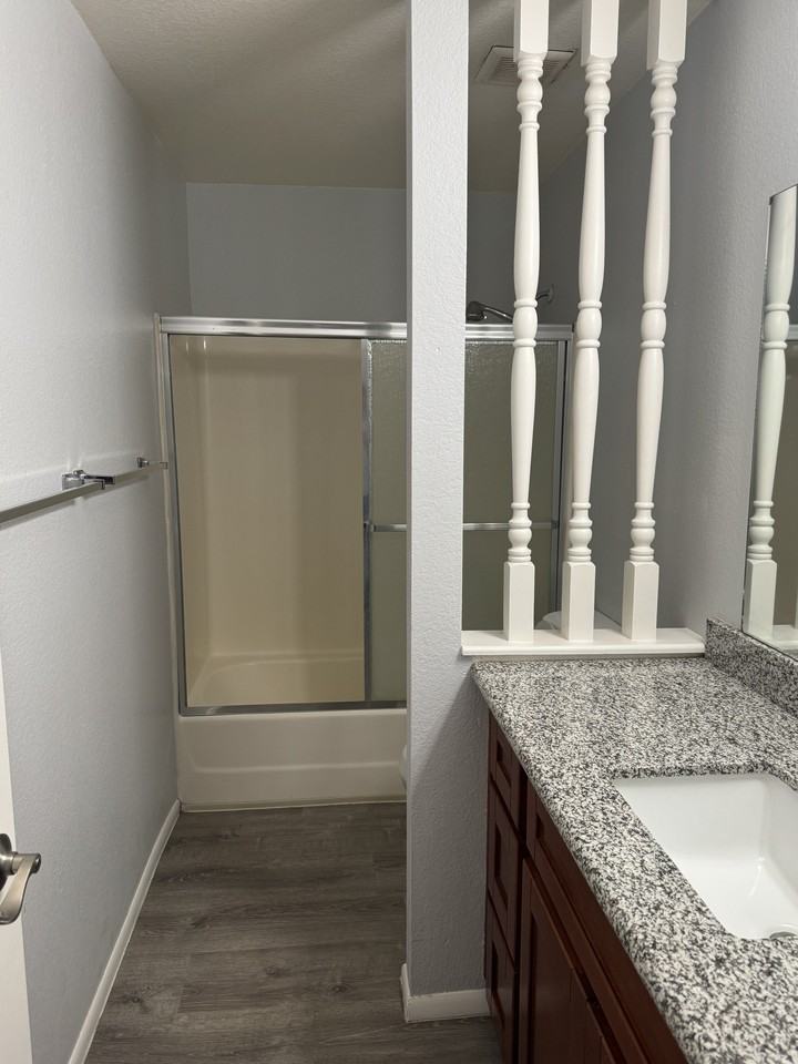 Premier Apartments - Photo 4 of 13
