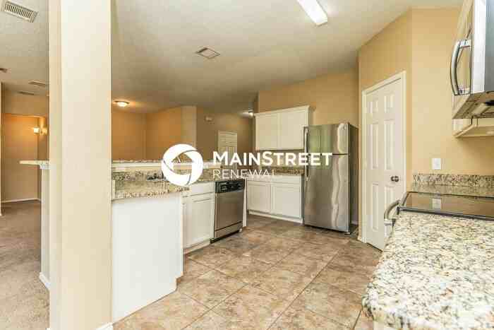 6909 Baybridge Dr - Photo 7 of 16