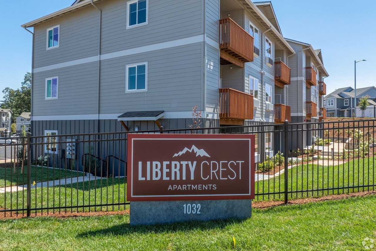 LIBERTY CREST APARTMENTS - Photo 2 of 50