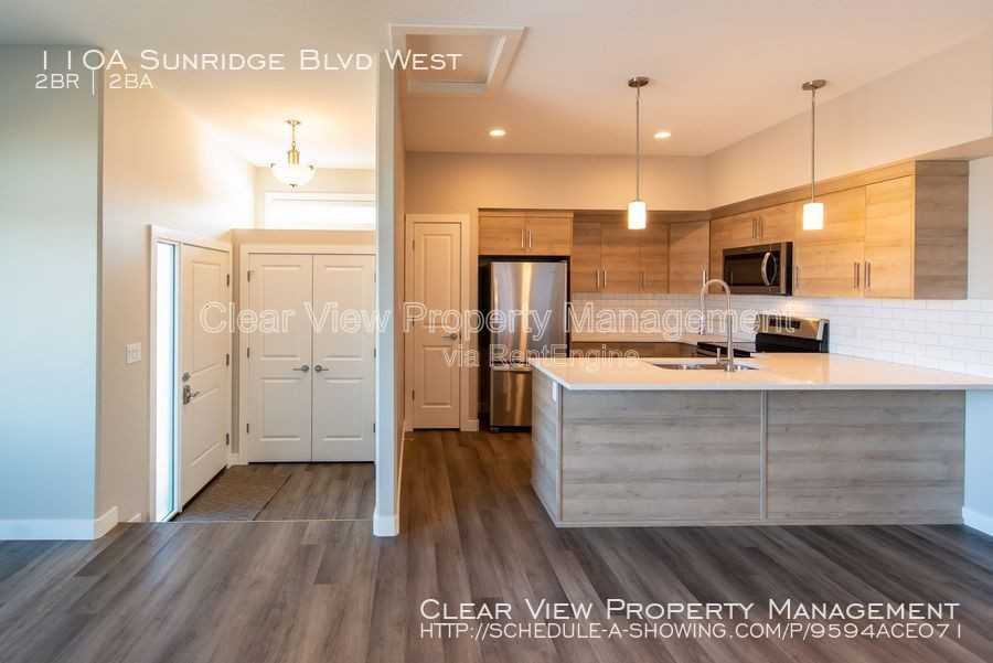 118 Sunridge Blvd W - Photo 2 of 12