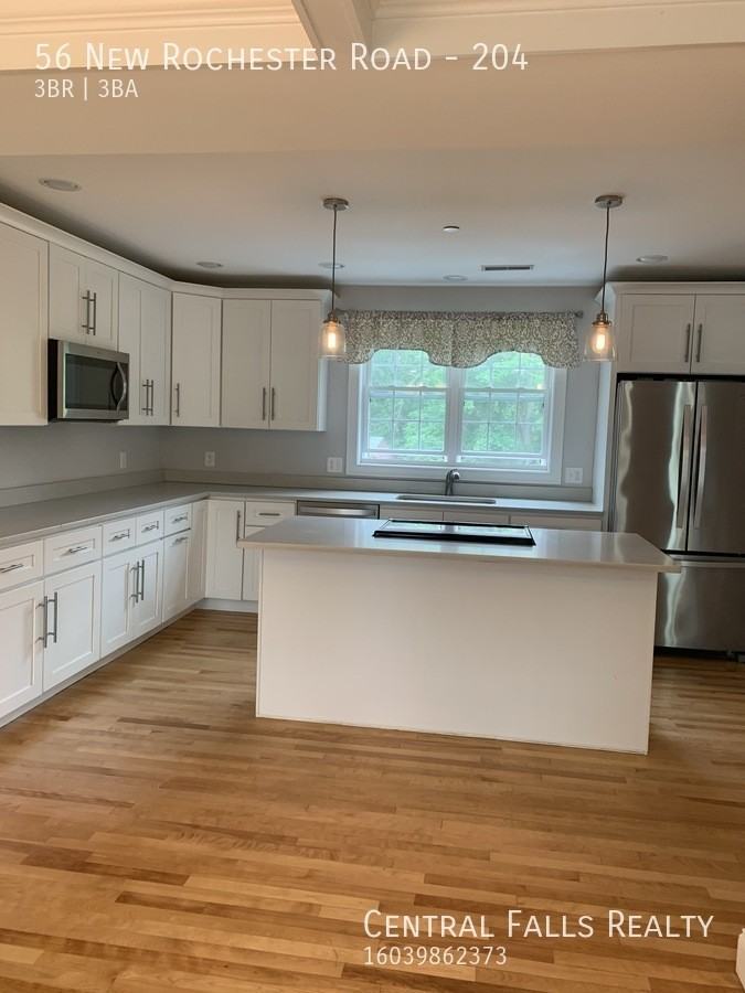 56 New Rochester Rd #204 - Photo 4 of 11