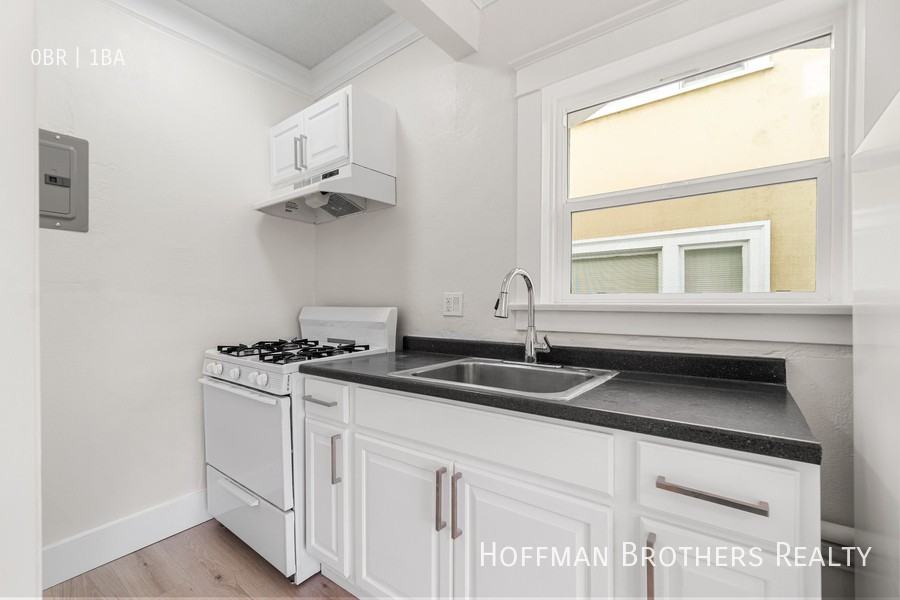 323 W 4th St #201 - Photo 5 of 21