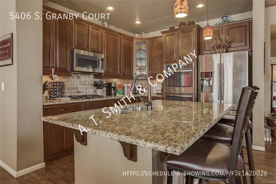 5406 S Granby Ct - Photo 3 of 23