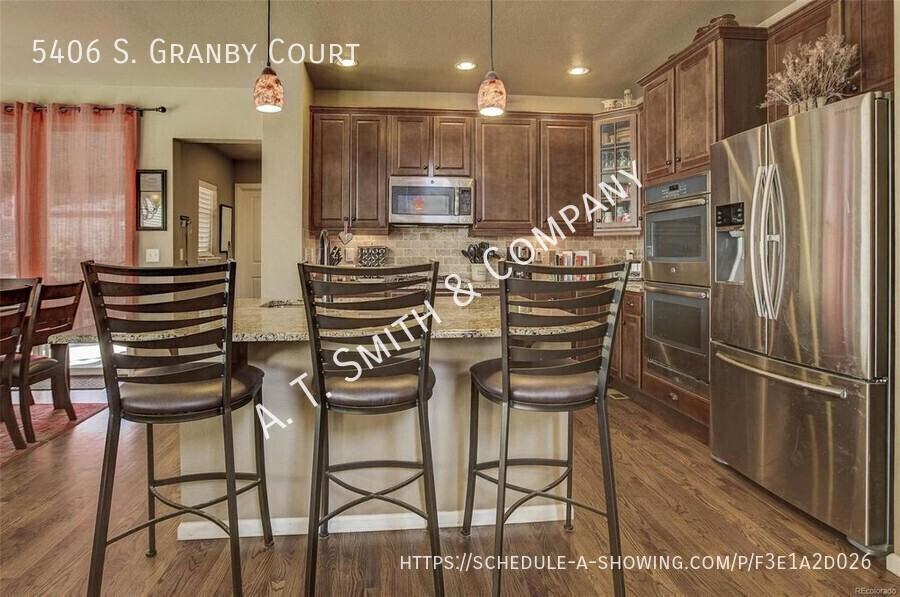5406 S Granby Ct - Photo 4 of 23