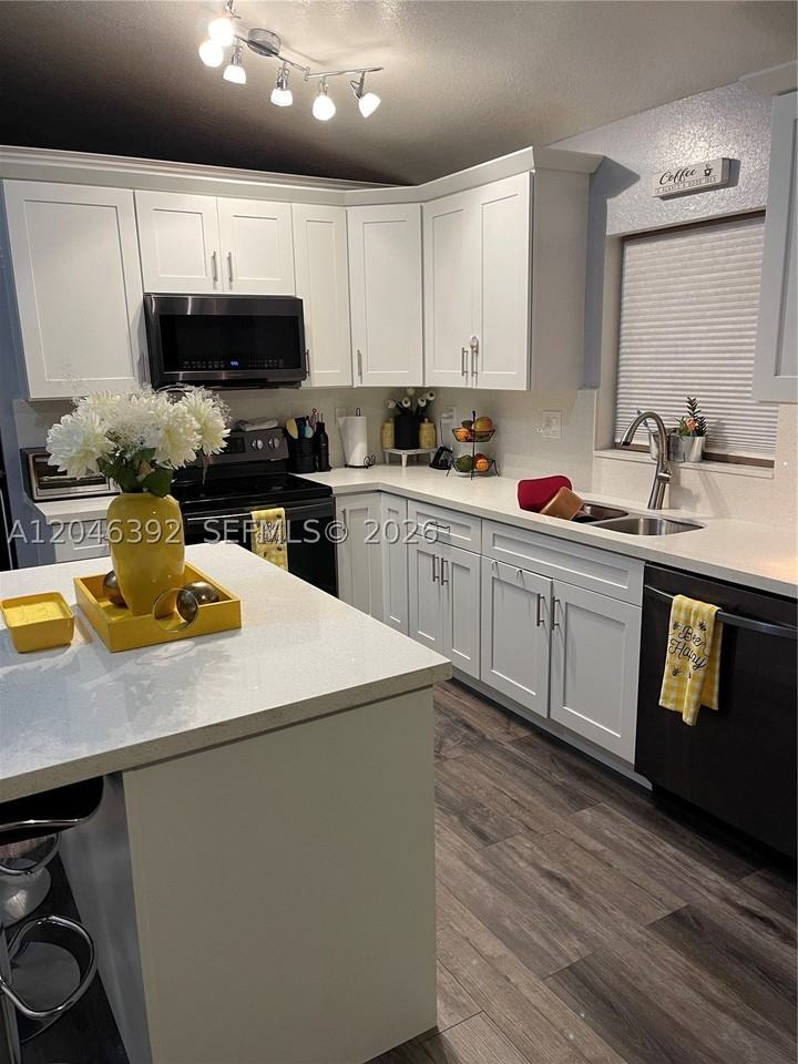 7805 Simms St - Photo 5 of 12