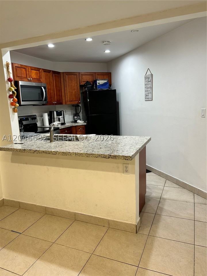 9421 Fontainebleau Blvd #202-35 - Photo 6 of 22