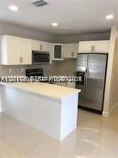 1575 Nw 127th St - Photo 3 of 8