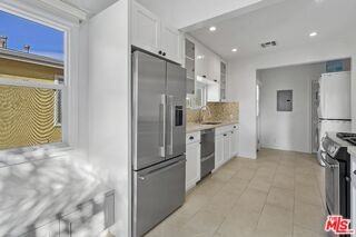 6113 Cashio St - Photo 7 of 8