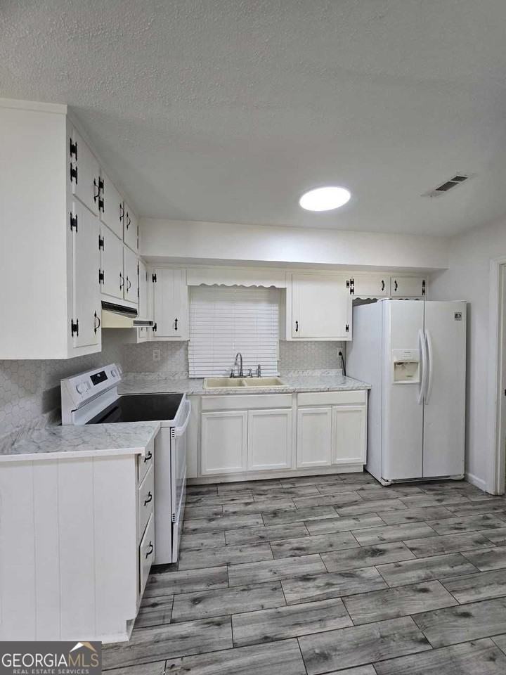 6589 Allatoona Rd - Photo 4 of 22