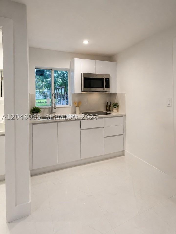 521 Nw 33rd Ave #1 - Photo 6 of 15
