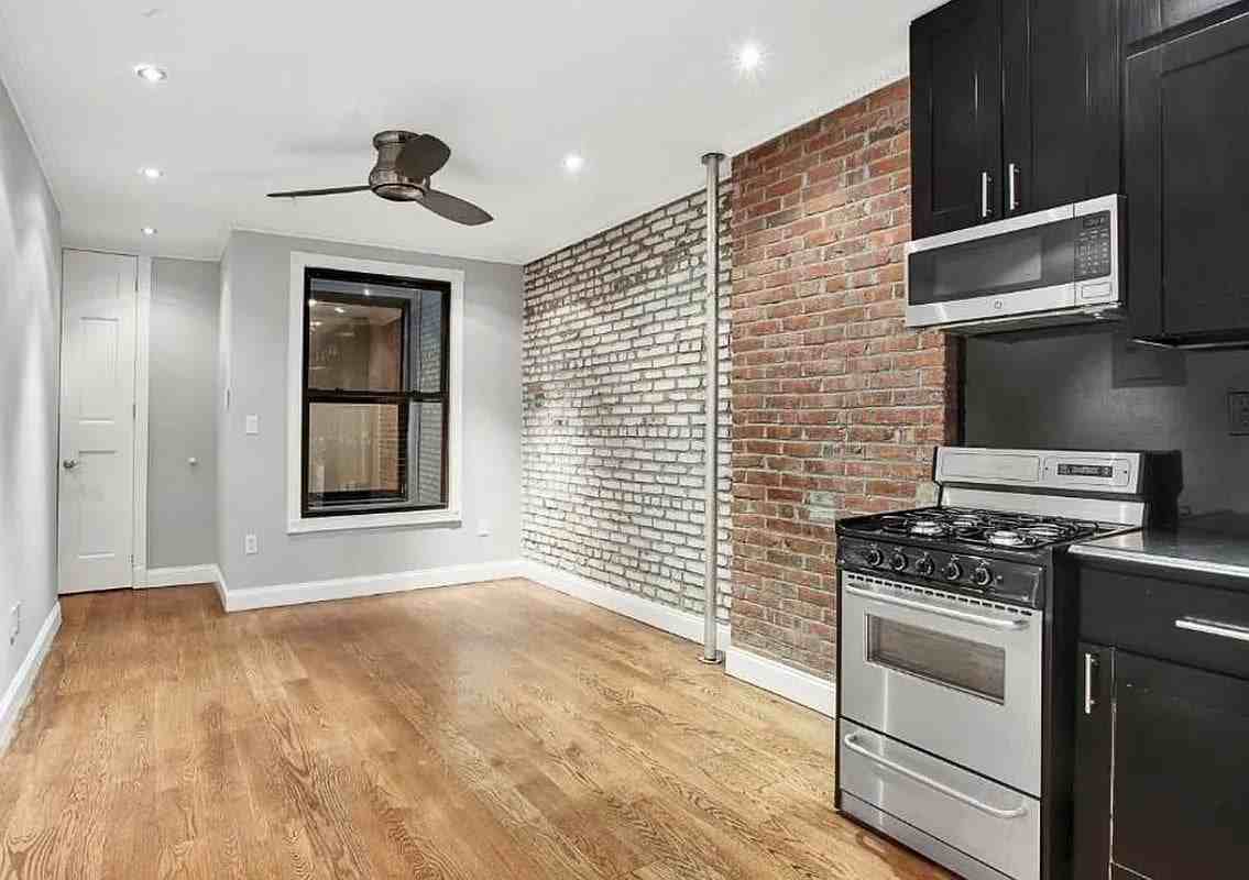 438 W 52nd St #9 - Photo 2 of 6