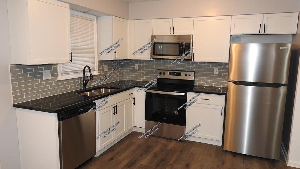 6905 Orchard St - Photo 4 of 35