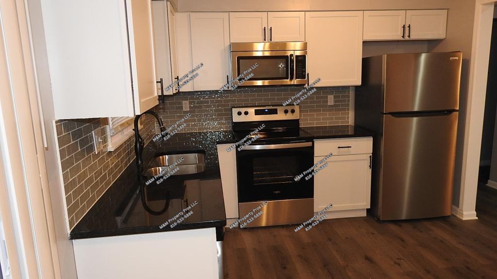 6905 Orchard St - Photo 5 of 35