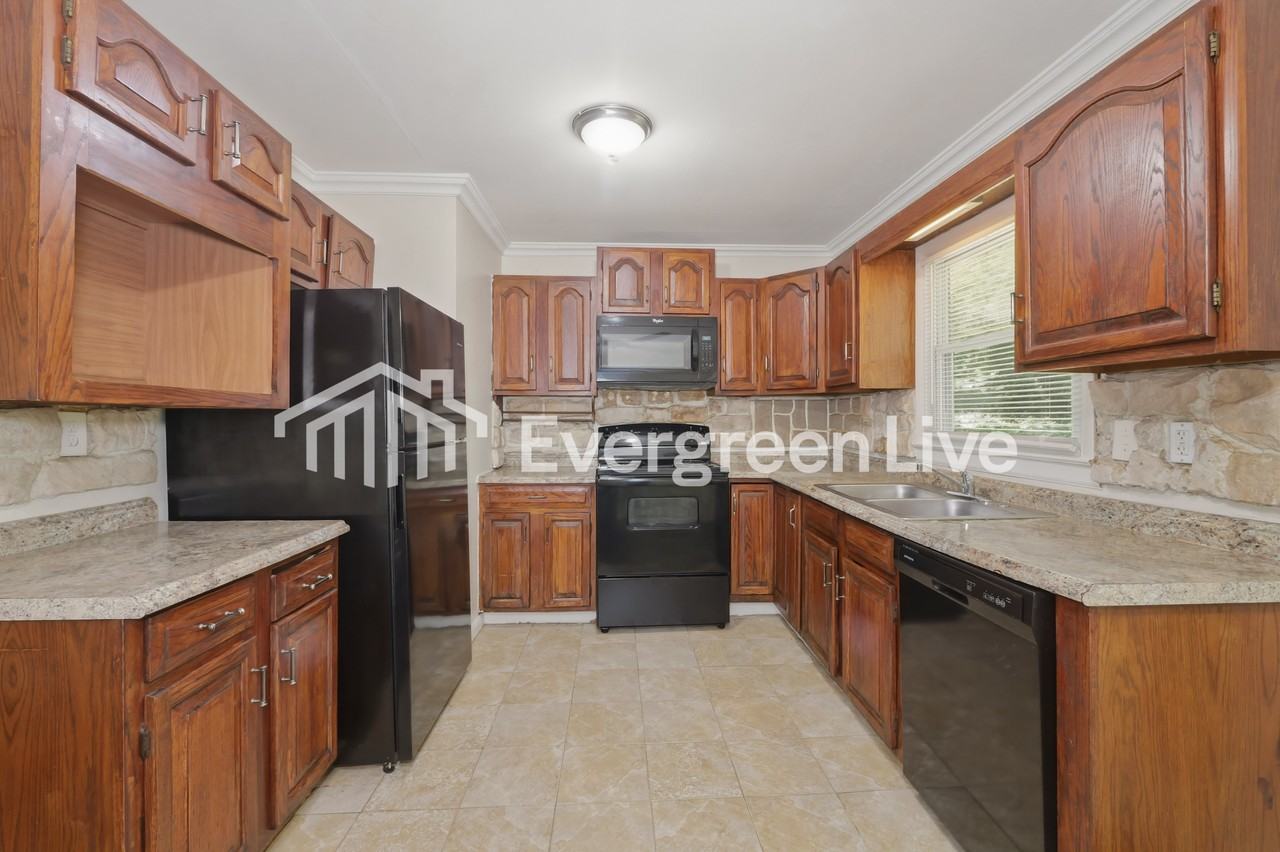 5907 E 99th Ter - Photo 7 of 15