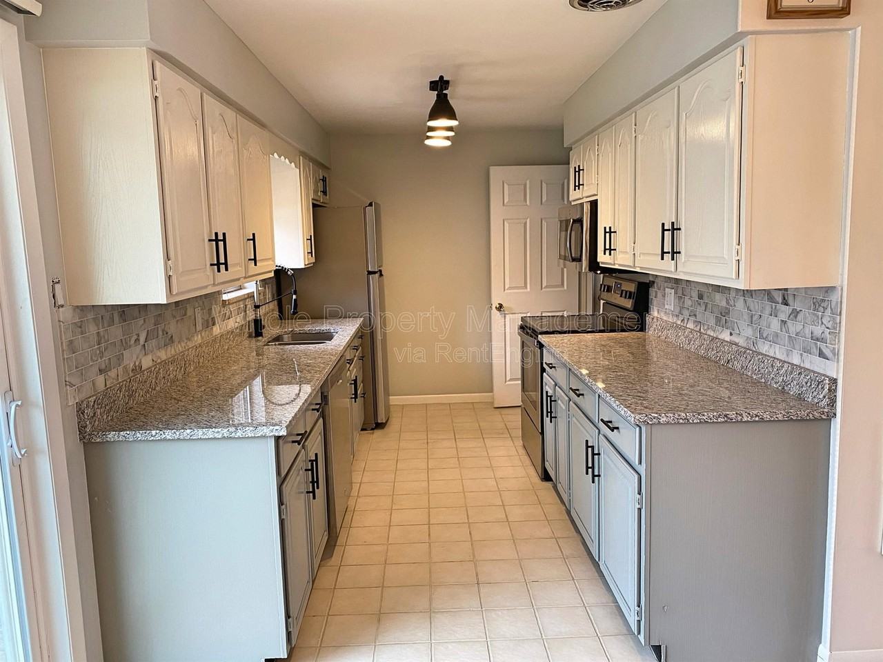 10640 W 62nd Pl - Photo 6 of 40