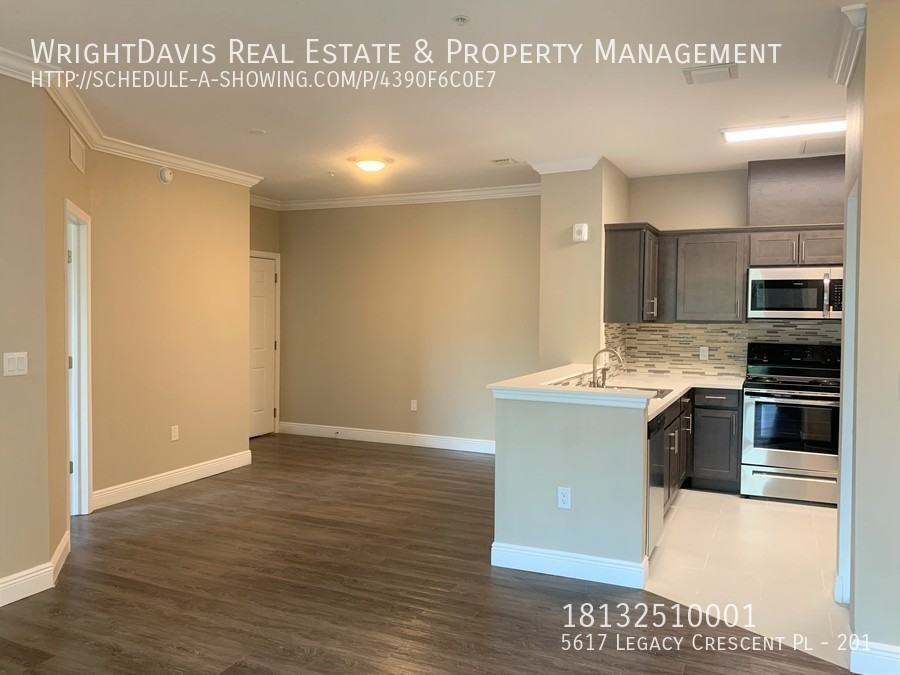 5617 Legacy Crescent Pl #201 - Photo 3 of 25