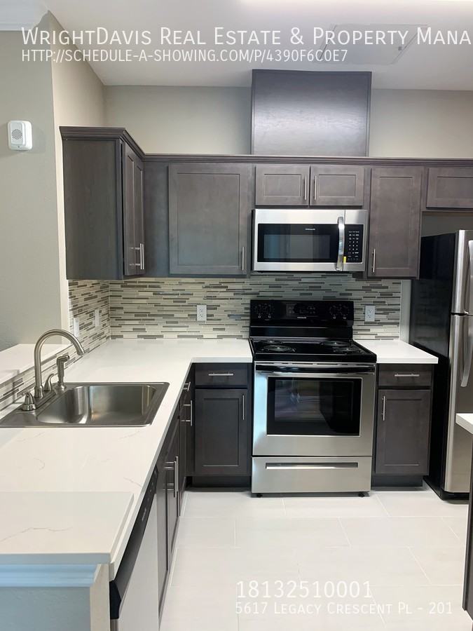 5617 Legacy Crescent Pl #201 - Photo 4 of 25