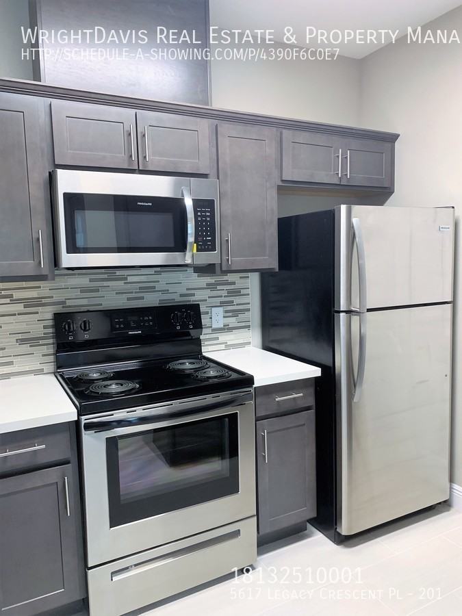 5617 Legacy Crescent Pl #201 - Photo 5 of 25