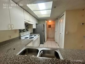 5011 Wiles Rd #3-207 - Photo 1 of 1