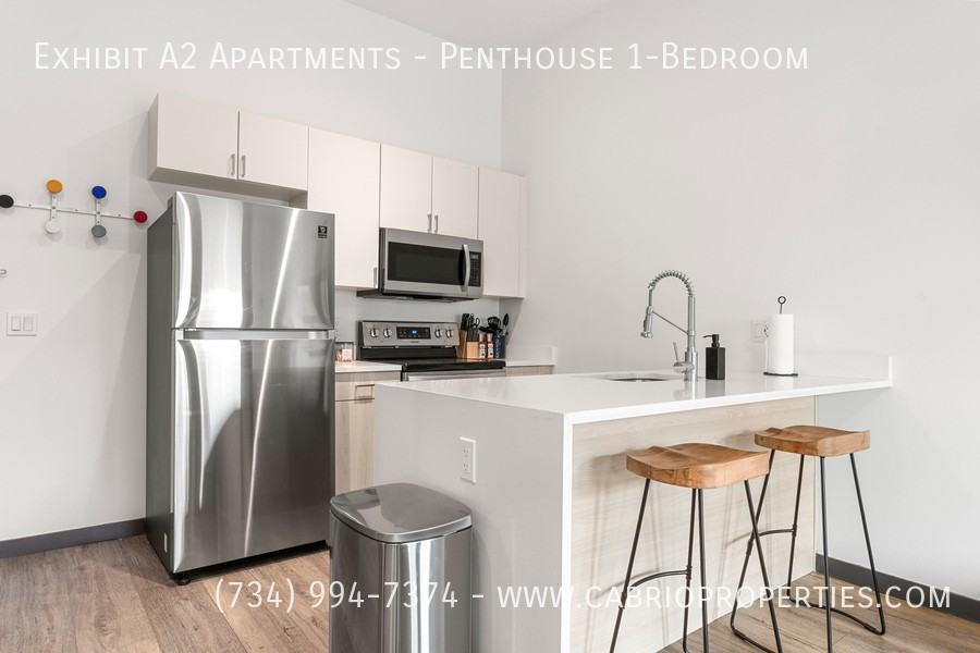 Exhibit A2 Apartments - Photo 2 of 7