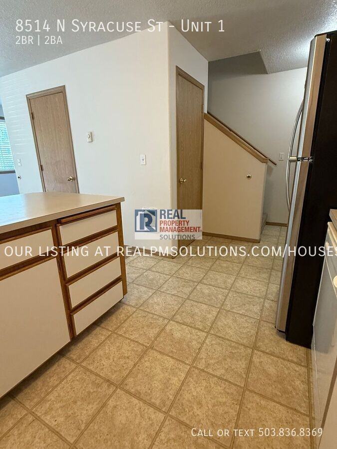 8514 N Syracuse St #1 - Photo 4 of 31