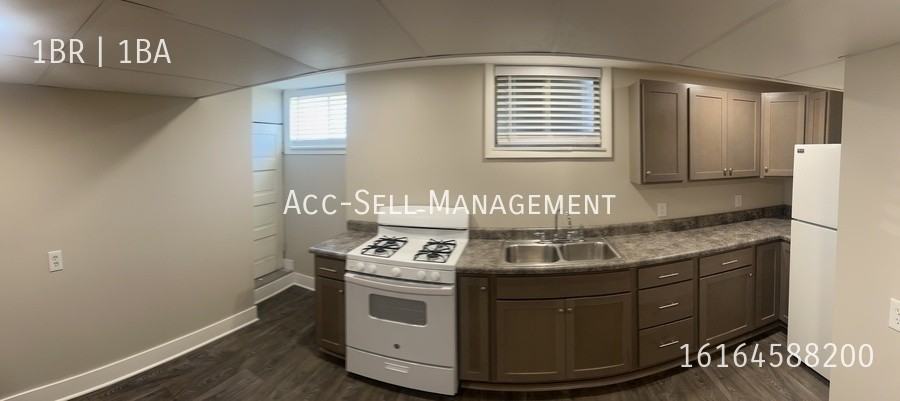 1571 Plainfield Ave Ne #1 - Photo 3 of 5
