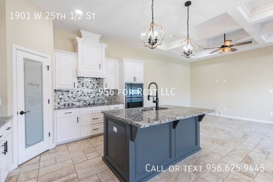 1901 W 25th 1/2 St - Photo 2 of 14