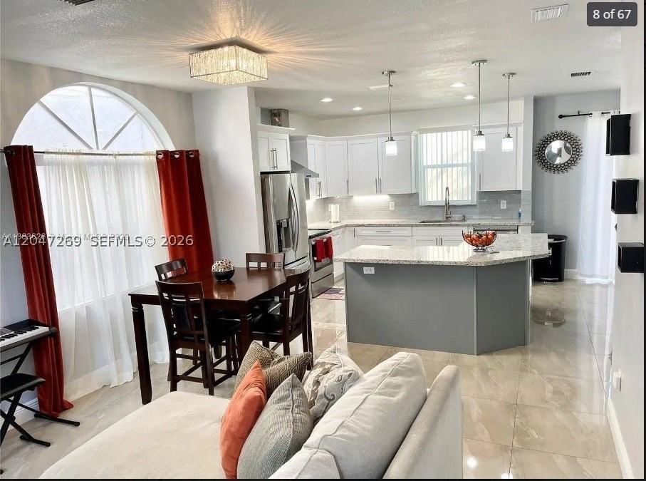 409 Nw 87th Ln - Photo 3 of 26