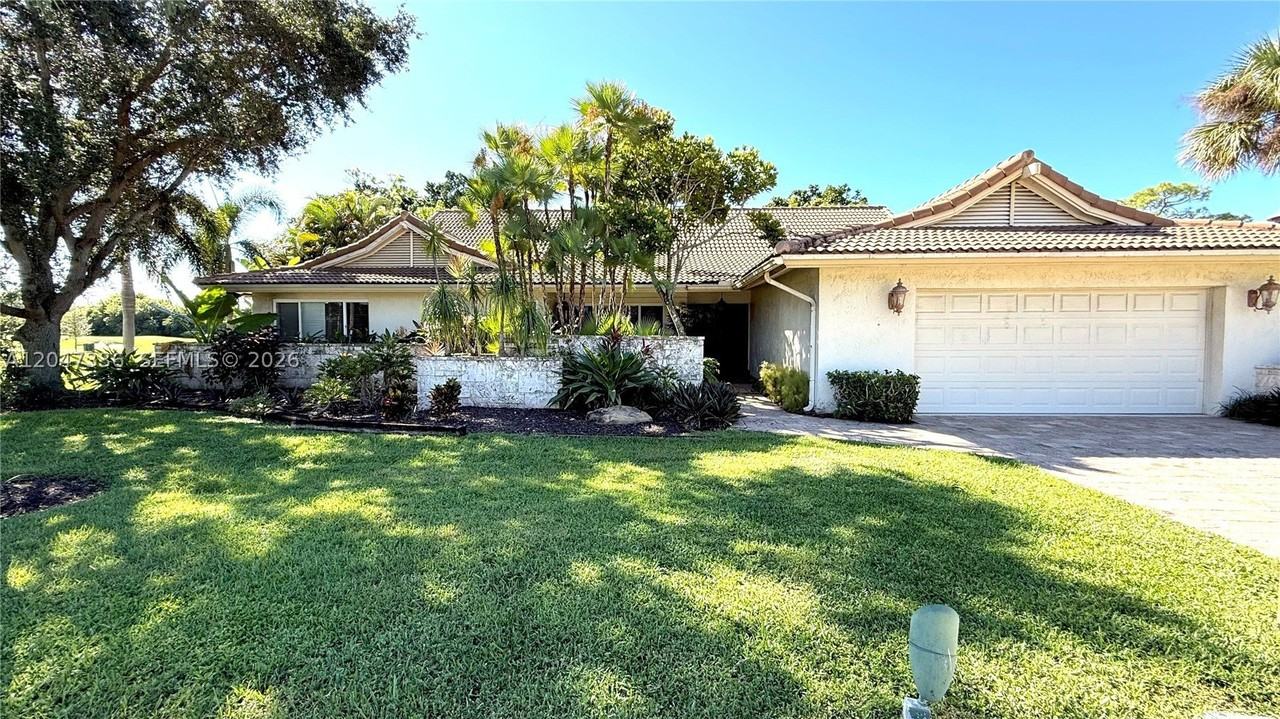 10134 Boca Woods Ln #1034 - Photo 2 of 12