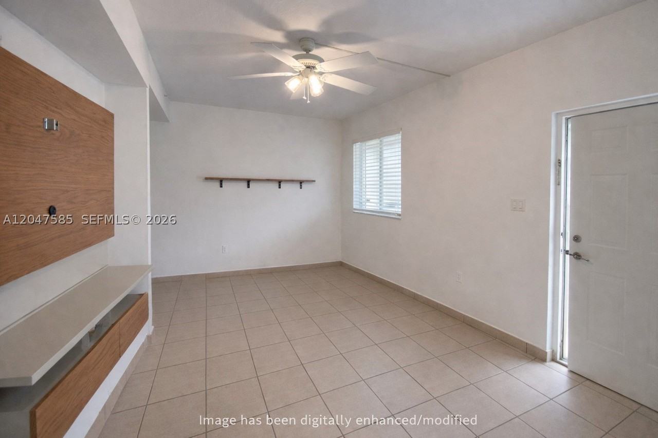 318 E 6th St #102 - Photo 4 of 14