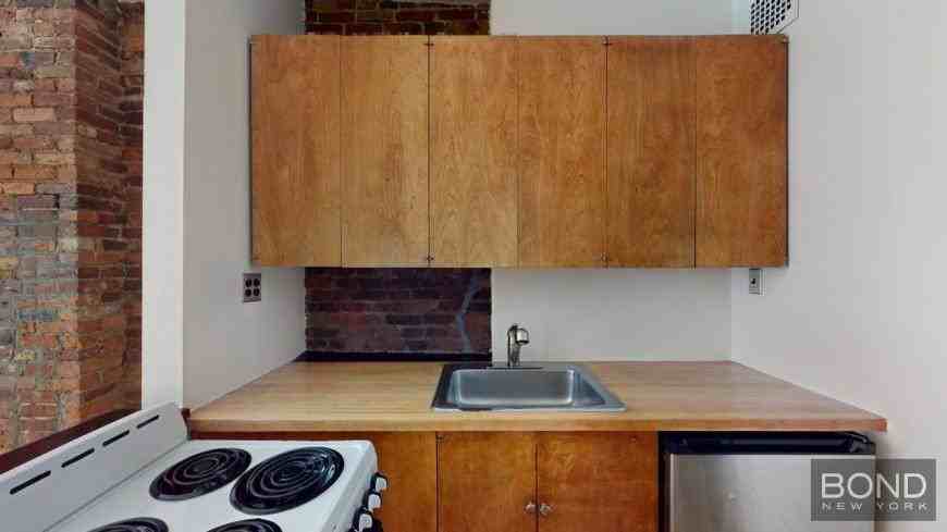 123 W 3rd St - Photo 2 of 9