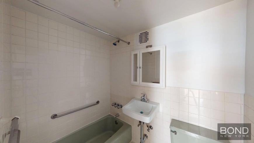 123 W 3rd St - Photo 3 of 9