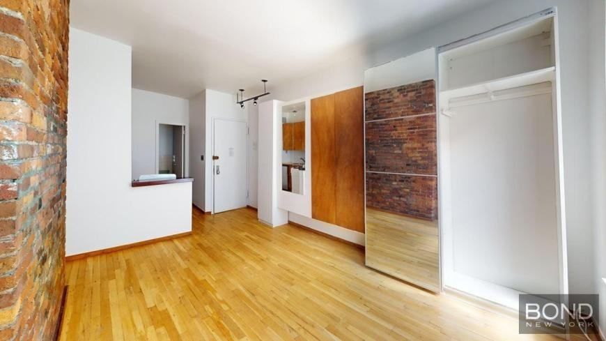 123 W 3rd St - Photo 6 of 9