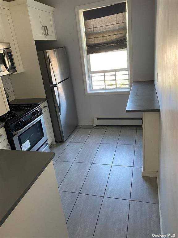 949 E 89th St - Photo 2 of 3