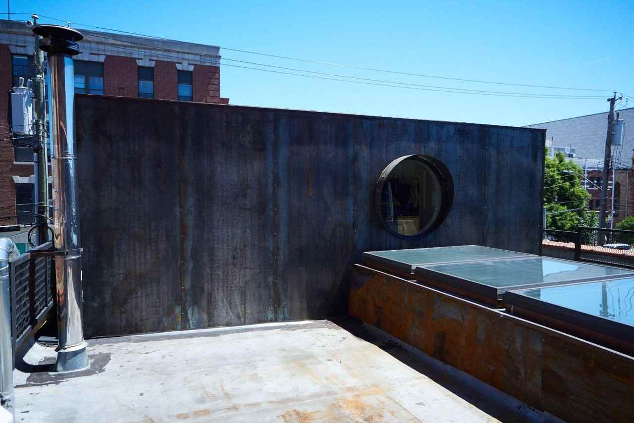 125 Wolcott St - Photo 7 of 9