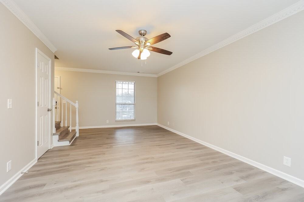 1409 Woodchimes Ct - Photo 5 of 17