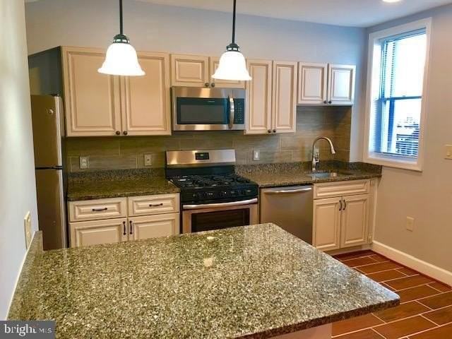 635 Kenyon St Nw - Photo 2 of 16