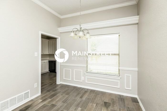 6304 Woodcreek Trl - Photo 4 of 12
