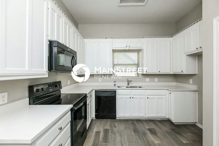 6304 Woodcreek Trl - Photo 7 of 12