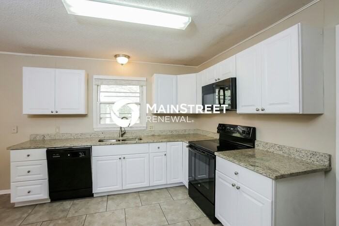 11816 E 32nd St S - Photo 6 of 17