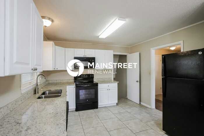 11816 E 32nd St S - Photo 7 of 17