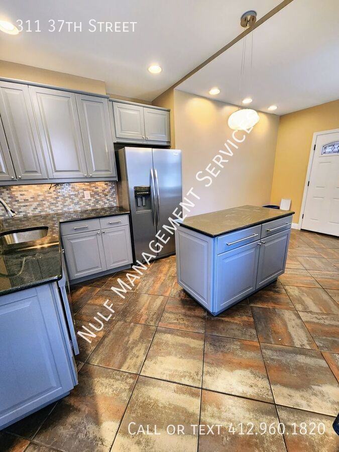 311 37th St - Photo 2 of 14
