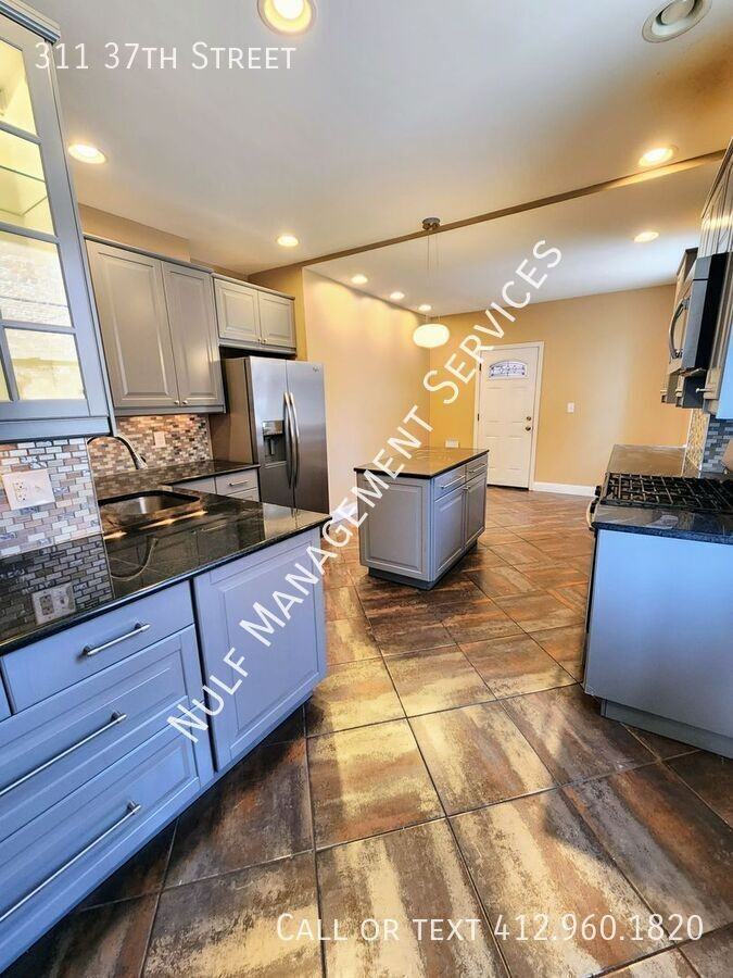 311 37th St - Photo 3 of 14