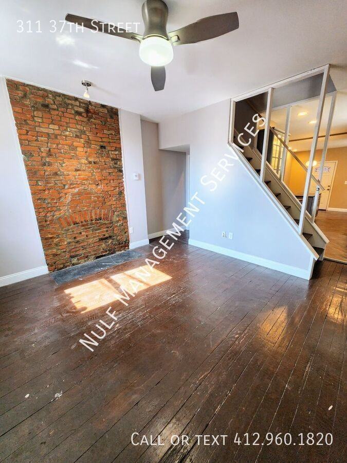 311 37th St - Photo 4 of 14
