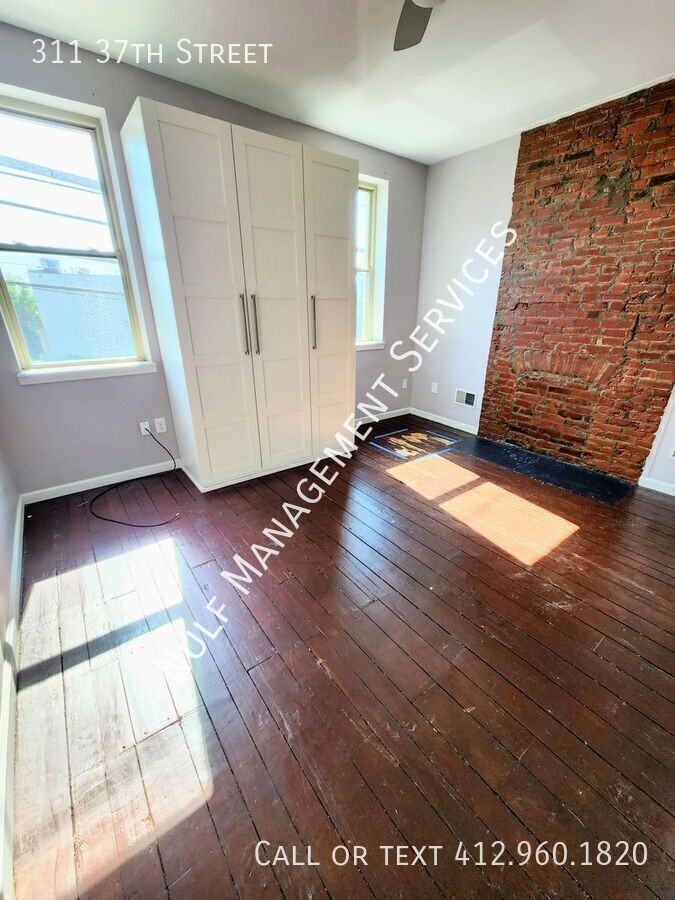 311 37th St - Photo 6 of 14