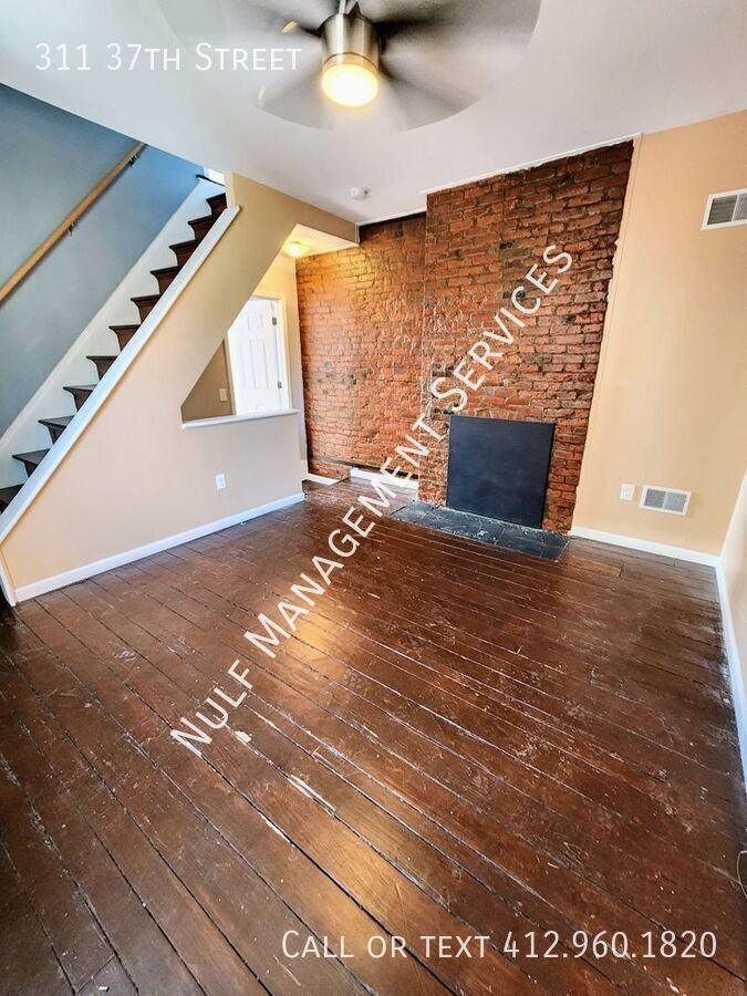 311 37th St - Photo 7 of 14