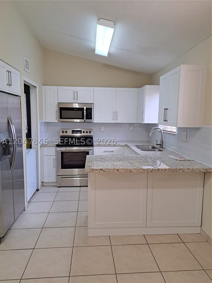 17318 Nw 74th Ave #202 - Photo 2 of 16