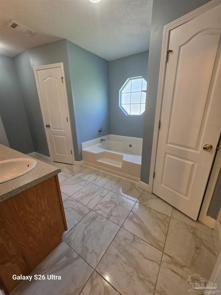 7042 Plank Dr - Photo 2 of 24