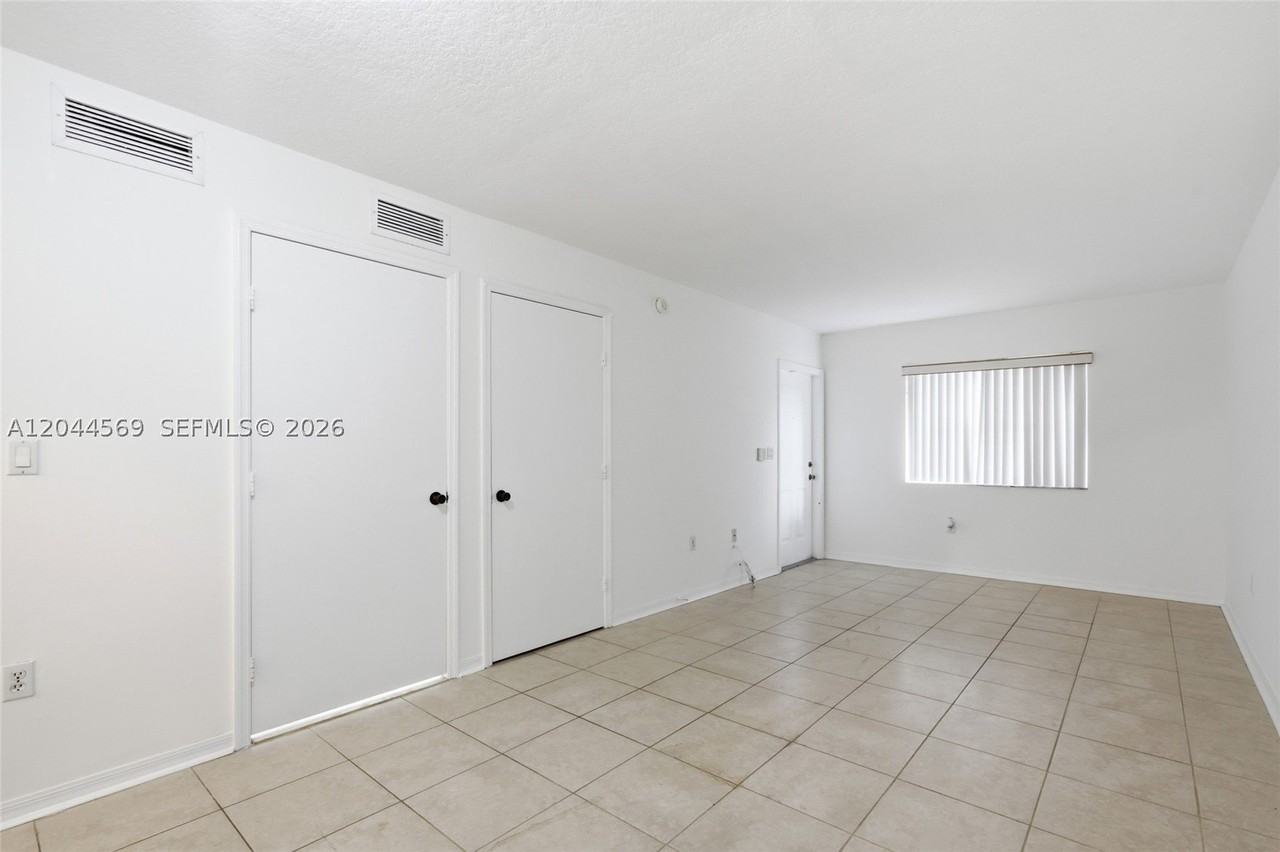 1251 Se 29th St #102-26 - Photo 4 of 12